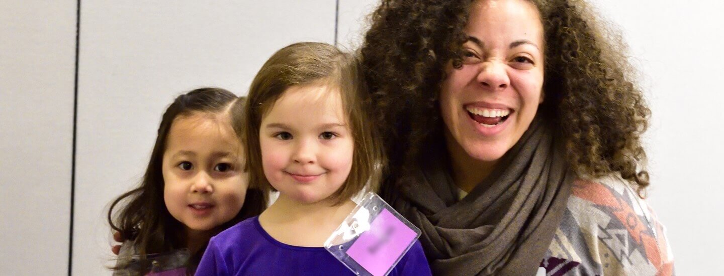 Mother and Daughters Smiling